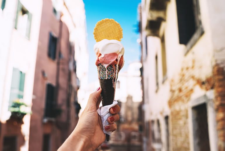 beautiful delicious italian gelato waffle cone front streets bridges venice 1