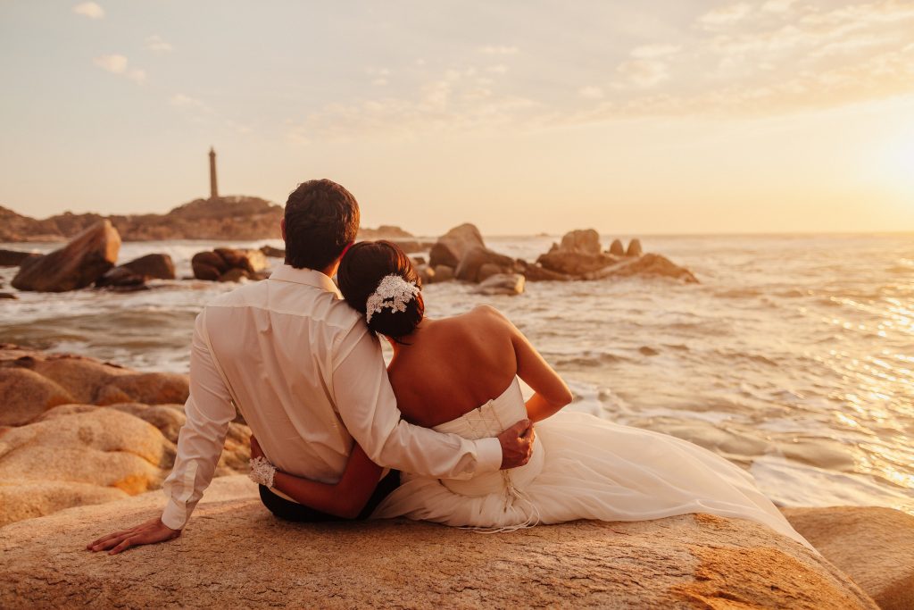honeymoon couple relax on sunset beach 2022 02 02 03 59 45 utc scaled